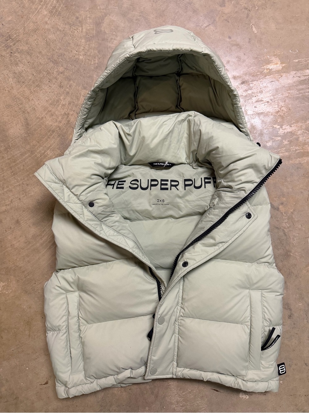 Aritzia The Super Puff Hooded Puffer Vest in Light Sage